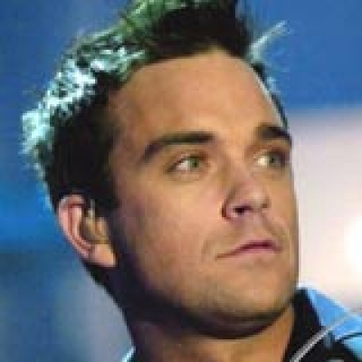 Ο Robbie Williams & ο Gary Barlow σε συναυλία.